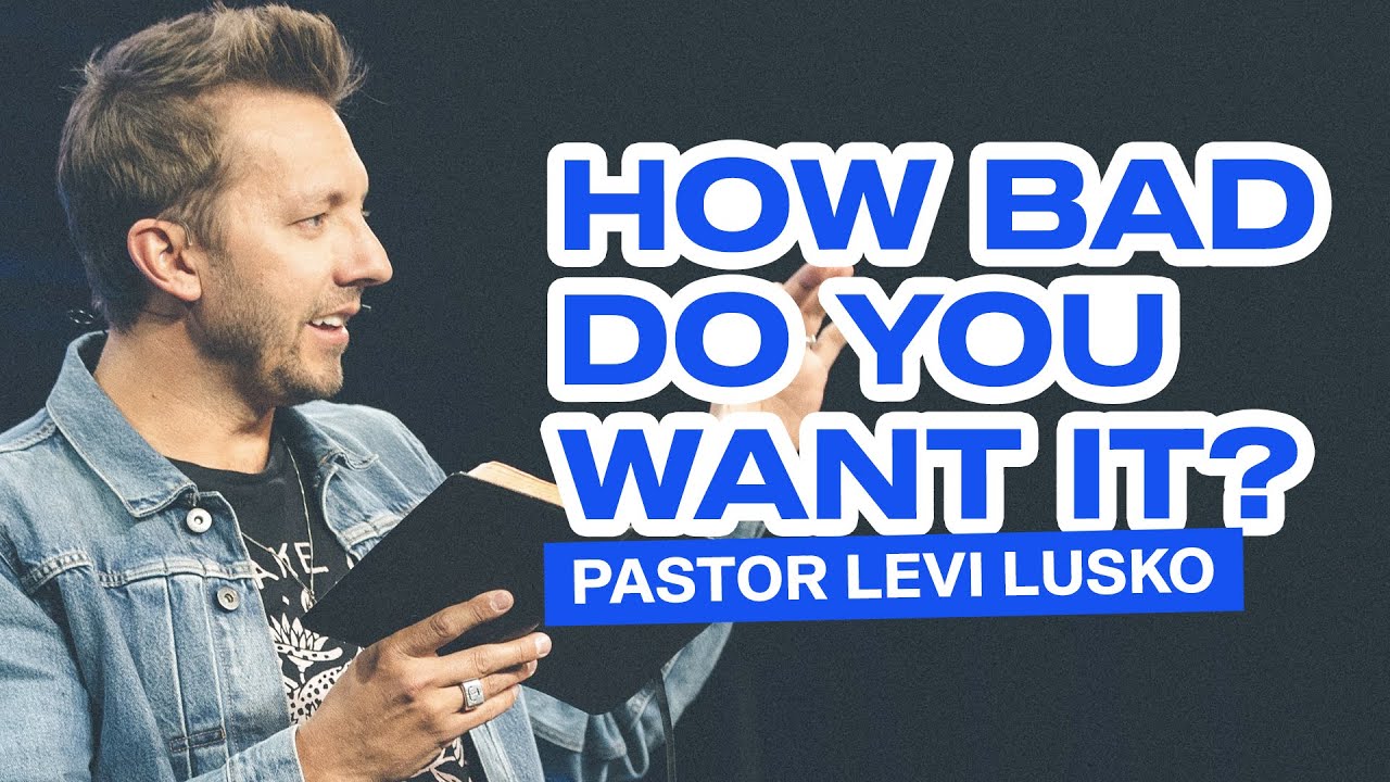 Levi Lusko holding a bible preaching