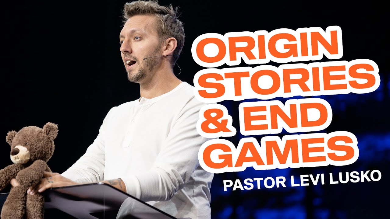 Levi Lusko holding a teddy bear preaching about origin stories